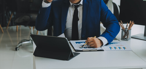 Team of business people working together in the meeting room office, teamwork background charts and graphs banner, double exposure successful teamwork,business planning concept.