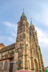 Fototapeta na wymiar Nuremberg, Germany – Saint Lorenz Dome, cathedral, church in historical downtown of the city at sunset colors