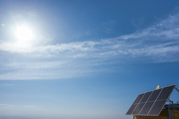 Photovoltaic modules on the roof of a house on a sunny day