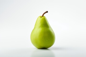 Photo of a shiny green pear on a spotless white surface. Generative AI