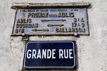 Old and new street name sign - village in Eure et Loire - Bleury - Saint Symphorien and Gallardon - France