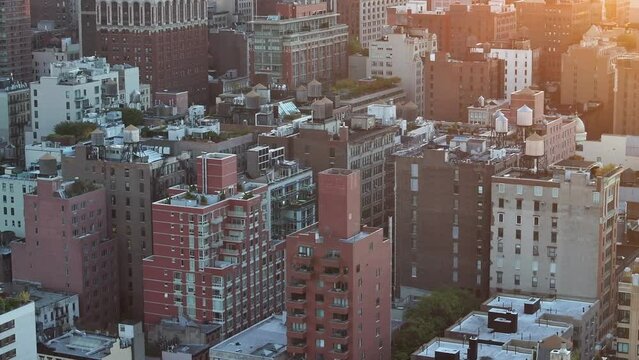 Aerial view of nondescript buildings in Downtown New York City at sunrise