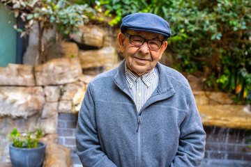 Portrait of a senior man with beret in a geriatric