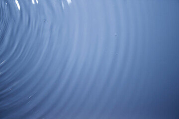 Clear blue natural waves with a shimmer.