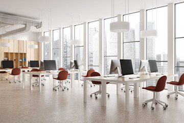 Stylish coworking interior with pc desktop and chairs, panoramic window