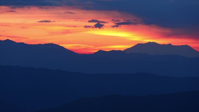 sunset over mountains, time lapse