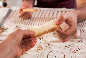 give a piece of white durum wheat bread to another