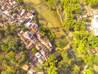 Drone Photography. Aerial Landscape of Spacious Rice Fields in the countryside of Bandung City -...