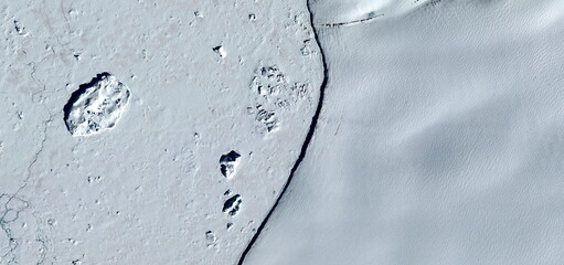 the platform cracking, global warming, photographs of the frozen regions of the earth from the air,...