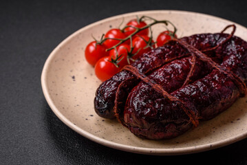 Delicious black blood sausage or black pudding with spices and herbs