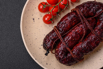 Delicious black blood sausage or black pudding with spices and herbs