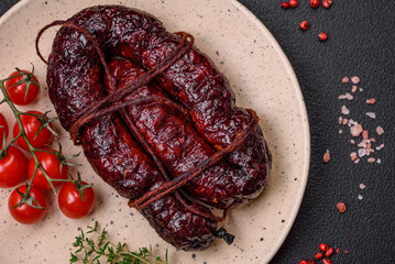 Delicious black blood sausage or black pudding with spices and herbs