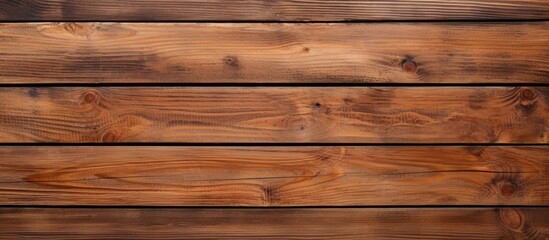 Obraz na płótnie Canvas Brown wooden planks on a textured backdrop