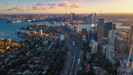Aerial drone view of Sydney City and Sydney Harbour looking from North Sydney in the late afternoon...