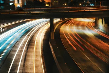 Photo sur Aluminium Autoroute dans la nuit an image of car trails at night time with traffic lights