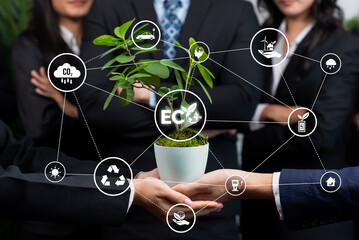 Business partnership nurturing or growing plant together with carbon icon symbolize ESG sustainable...