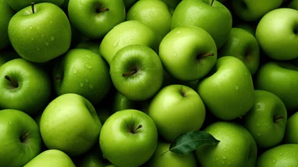 Fotobehang A full-texture of green apples. A background made of fruit. © Mirador