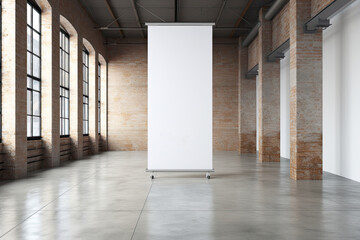 white empty stand rollup in a light minimalist office interior. mockup for the presentation of business ideas and products. interior with high ceilings and windows, brick walls.