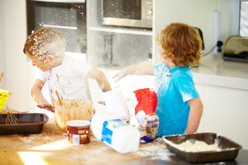 Brother, baking and flour with children fighting in the kitchen while making a mess of their home...
