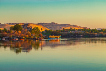 Fototapeta na wymiar Picturesque dawn on the Nile River near the famous Nubian village.