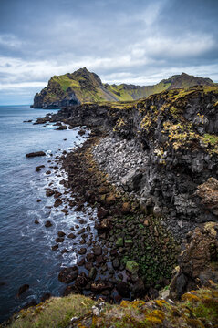 Rocky cliffs on the west side of the icelandic island Heimaey