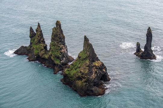 Iconic rock formation in the sea at the south coast of Iceland