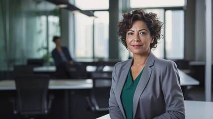 Fototapeta premium Portrait of a mid adult Mexican businesswoman 