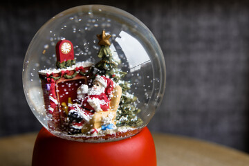 A crystall ball with Santa Claus