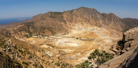 Stefanos crater of volcano in Nisiros, Kos, Dodecanese, Greece with sulfur and fumarole