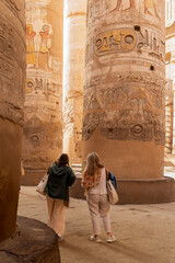 two women visit karnak temple. Luxor. Egypt