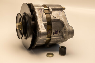 Alternator, generator, part of the vehicle's drive unit, aluminum casting, macro, close-up