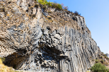symphony of the stones - natural basalt rocks in Garni gorge in Armenia on sunny autumn day
