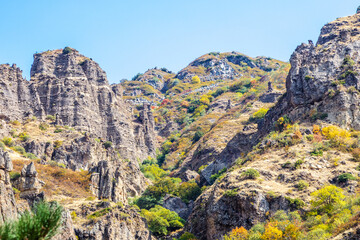 colorful mountains in river gorge near Geghard in Armenia on sunny autumn day