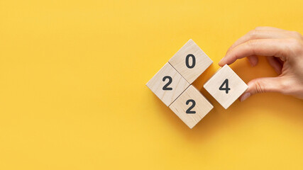 2024 - numbers on wooden cubes. The coming of the new year 2024