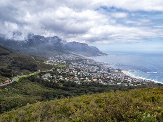 Aerial view of Camps Bay with the view of the Twelve Apostles mountain range.