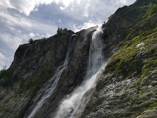 Fototapeta na wymiar Arkhyz. Hike to the Sofia waterfalls. One day hike. Nine powerful streams
