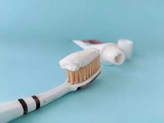 Toothbrush with white paste as a tooth cleaning tool