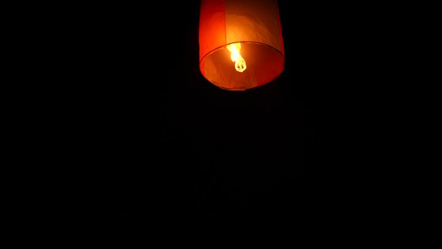 Thousands of glowing sky lanterns are released into the night sky to wish for good luck as part of a lantern festival