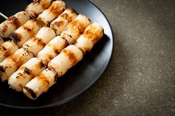 grilled tube shaped fish paste cake skewe or tube squid skewer