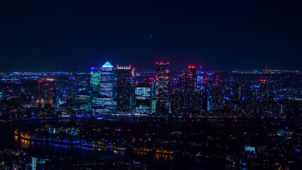 London, United Kingdom - The bank district of central London with famous skyscrapers. London skyline at night.  - obrazy, fototapety, plakaty