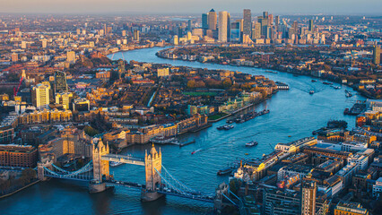 Aerial panoramic cityscape view of London and the River Thames, England, United Kingdom. Tower of London. anorama include river Thames, Tower bridge and City of London and Canary Wharf buildings.  - obrazy, fototapety, plakaty
