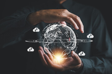 Confidently holding the cloud computing icon, the businessman signifies the reliance on cloud technology. Efficient data transfer and convenient online storage for business network on the internet.