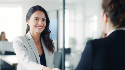 Obraz premium portrait of a professional businesswoman when shaking hands