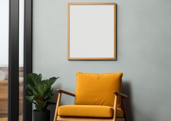 Wall art empty picture frame mockup on wooden desk, wall, table. Vase with olive branches, cactus. Elegant working space, home office concept.