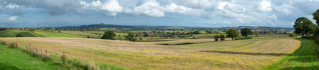 Wide panorama of beautiful Cotswold landscape on a sunny autumn day with  a long vista. English countryside - 669149836
