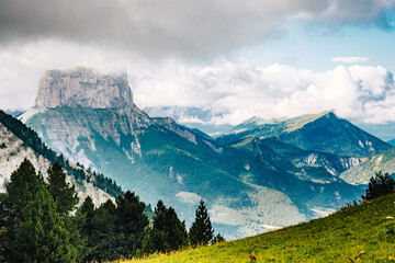View of Mont Aiguille in the Vercors from the Alpine Meadows and Cliffs of the Vallon De Combeau...