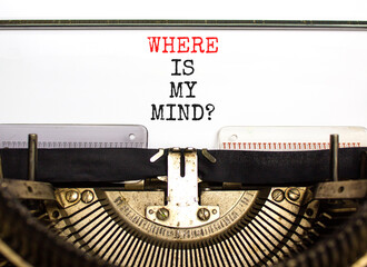 Where is my mind symbol. Concept words Where is my mind typed on beautiful old retro typewriter. Beautiful white paper background. Business, motivational and where is my mind concept. Copy space.