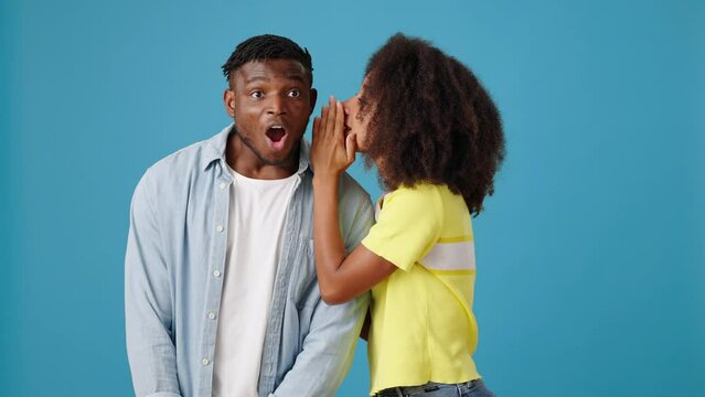 Pretty African-American woman tells shocking secret to man