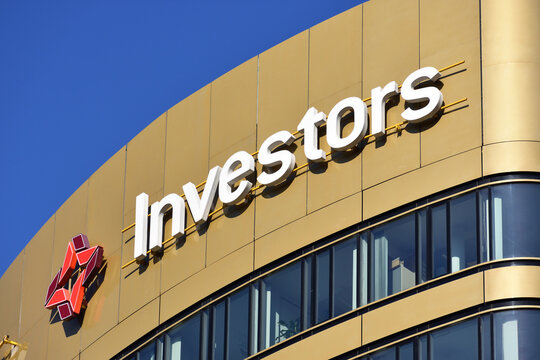 Investors TFI, investment foundation company. Signage, logo, emblem on the office facade. WARSAW, POLAND - FEBRUARY 12, 2022