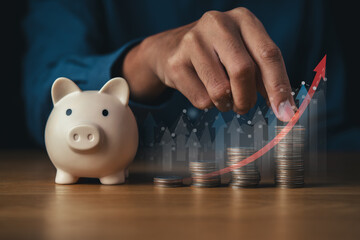 saving money wealth and financial investment concept.coins stack with pink piggy bank background.